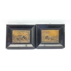Pair of relief cast metal plaques modelled as hunting dogs in landscapes, in ebonised frames, 125cm x 131cm 