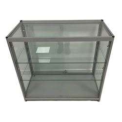 Low full height shop display or jewellery cabinet, glazed top and sides with two sliding doors, fitted with two glass shelves
