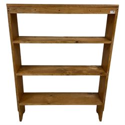 Pine bookcase, fitted with three shelves