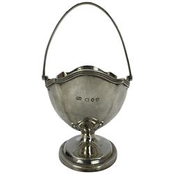 Victorian silver oval sugar basket of fluted design, reeded border and swing handle on pedestal foot London 1890 Maker Goldsmiths Alliance Ltd 