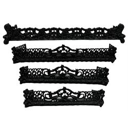 Three Victorian design graduated cast iron fire fenders, each of rounded rectangular form, cast with acanthus scrolls and flowering festoons, together with a similar design fender, L127cm x D25cm