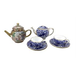 18th century Chinese Famille Rose teapot of globular form, together with a Royal Crown Derby Peacock Blue teapot, two teacups and four saucers