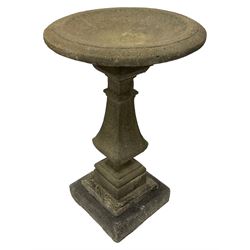 Victorian design cast stone garden bird bath, shallow dished top over stepped and turned square pedestal