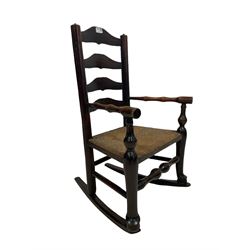 19th century childs rocking chair, the ladder back over rush seat 