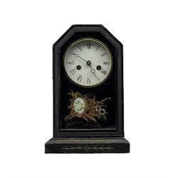  A 19th century two train German shelf clock, 30hr movement striking the hours on a coiled gong, with a full-length glazed door, painted glass tablet with floral decoration and a gold painted dial bezel, white painted dial with Roman numerals and minute track, moon hands and winding collets, Juhngans trade label attached to the rear of case.
With pendulum.


