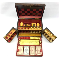 Victorian coromandel Games Compendium containing folding Chess & Backgammon board, red stained & natural Chess, Draughts pieces and Dominoes, brass Cribbage board, two treen dice shakers, Whist markers, Bridge score cards and playing cards, inset ivory label for Allen, Maker, 37 Strand, London and Lozenge Registration Mark for 29th November 1869, W33cm, H17.5cm, D22.5cm