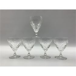 Five Edinburgh crystal wine glasses cut with flowers and thistles 