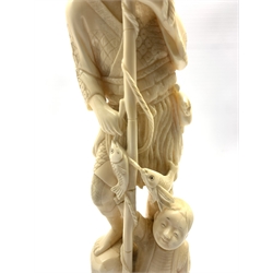 Japanese Meiji ivory Okimono of a Fisherman and young boy, H35.5cm together with a similar age Japanese ivory Okimono of a Sage, standing in long robe holding a ruyi scpetre on hardwood stand (2)