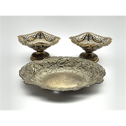 Pair of Victorian silver sweetmeat dishes on pedestal bases London 1894 Maker Phineas Harris Levi and an oval silver dish with embossed decoration Chester 1897 W23cm 14oz