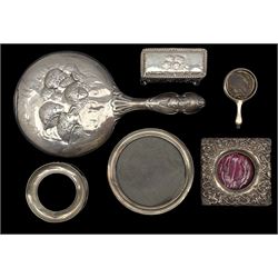 Edwardian silver hand mirror and dressing table jar each embossed with Reynold's Angels maker Henry Matthews, embossed silver picture frame, two other silver frames and a silver hand mirror pendant 
