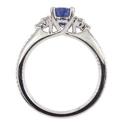 Platinum oval sapphire and six stone diamond ring, hallmarked, sapphire approx 0.90 carat, total diamond weight approx 0.30 carat