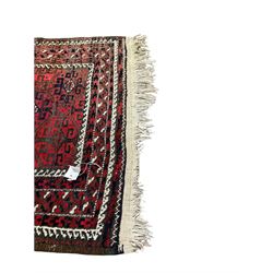 Persian rug, the red and field with geometric design surrounded by a red border 210cm x 90cm