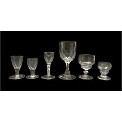 Early 19th century small cordial glass with cotton twist stem H12cm, two Georgian glasses with ogee bowls, two other small Georgian glasses and a Victorian glass (6)