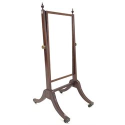 Early 19th century mahogany cheval dressing mirror, turned urn finials over square tapered and moulded uprights, swing mirror, raised on four splayed supports with brass cup castors W67cm