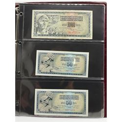 World banknotes including Bank of China five Yuan 1937 'BK268410', The United States of America one Dollar and five Dollars banknotes, British Armed Forces vouchers etc, housed in an album