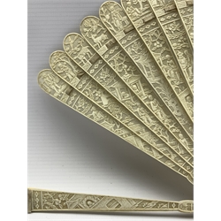 19th century Chinese Canton carved ivory brise fan: each pierced stick intricately carved on one side with a continuous scene of figures in a landscape, central cartouche, with an upper border of animals and figures, H21cm x W36cm open