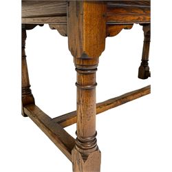 Jacobean style oak refectory dining table, rectangular plank top with breadboarded ends, moulded frieze rails on turned supports joined by H-shaped stretchers