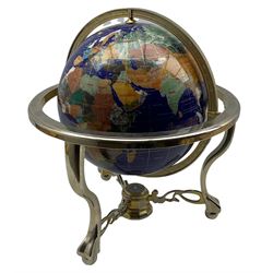 Table top terrestrial globe inset with semi precious stones on a blue ground in metal frame with compass H50cm