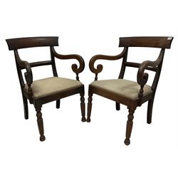 Pair of mahogany regency design elbow chairs, the shaped cresting rail over scrolled arms and drop in seat pad, raised on octagonal supports 