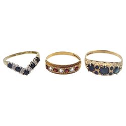 Gold sapphire and diamond wishbone ring, sapphire ring and a gold garnet and cubic zirconia ring, all hallmarked 9ct