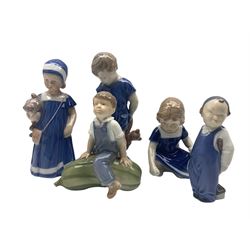 Collection of Royal Copenhagen figures of children including Boy with teddy no.3468, Girl with teddy no.671 together with no.4539, no.672 and no.3250 max H18cm(5)