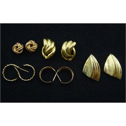 Four pairs of 9ct gold stud earrings and a pair of 14ct gold stud earrings, all stamped or hallmarked