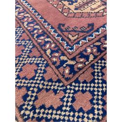 Afghan Bokhara rust ground rug, with gul motif and geometric design 183cm x 290cm