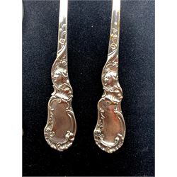 Set of twelve German 800 standard silver coffee spoons initialled 'R', spoon and fork by Stork with rococo stems and seven other items (21) approx 10oz