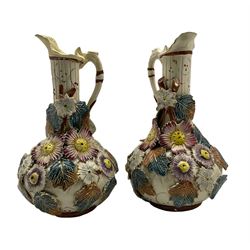 Pair of English majolica vases with applied flowers, and petal spouts H22cm
