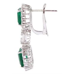 Pair of 18ct white gold octagonal cut emerald, pear cut and round brilliant cut diamond cluster pendant stud earrings, stamped, total emerald weight appro 4.85 carat, total diamond weight approx 2.85 carat