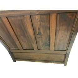 20th century oak settle, the four panelled back over seat with hinged lifting lid, raised on square supports W146cm, H136cm, D63cm  