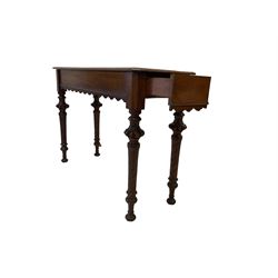Late 19th century oak console table, rectangular top with canted corners and moulded edges over shaped rail, fitted with single drawer to side, raised on globular carved and twist turned supports