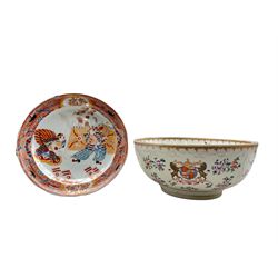 Late 19th century Samson of Paris porcelain punch bowl, painted in Chinese export style with an armorial and flower sprigs within spearhead borders, D29cm, together with a Japanese Imari decorated warming dish (2)