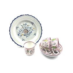 Early 19th century Pearlware plate painted in underglaze blue, green and ochre with flowers, within a feather moulded border, D22.5cm together with a pair of 19th century Staffordshire pink lustre tea cups and coffee can (6)