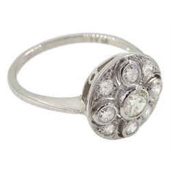 Platinum milgrain set round brilliant cut diamond circular cluster ring, stamped Plat