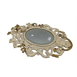 Cast metal and painted cherub mirror