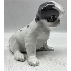 Royal Copenhagen model of a Pekingese dog in grey No. 448 together with another No. 445, both modelled by Erik Nielsen H14cm