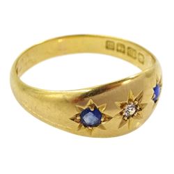 Edwardian 18ct gold gypsy set three stone sapphire and diamond ring, Birmingham 1911 