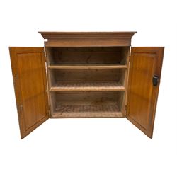 Victorian scumbled pine cupboard, the projecting cornice over two doors, opening to reveal two fixed shelves 