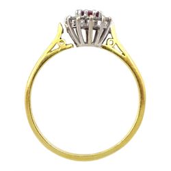 18ct gold oval ruby and round brilliant cut diamond cluster ring, 