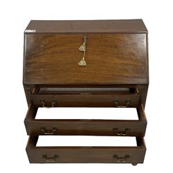 Early 20th century mahogany bureau, fall-front enclosing fitted interior, over three graduating drawers, raised on cabriole feet