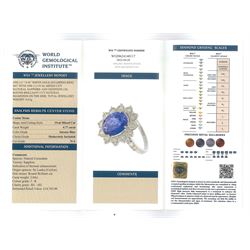 18ct white gold oval sapphire and round brilliant cut diamond cluster ring, with diamond set shoulders, stamped 18K, sapphire 4.77 carat, total diamond weight 2.04 carat, with World Gemological Institute report