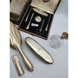 Pair of gentlemans engine turned silver backed hair brushes Birmingham 1958 with inscription, cased, set of silver manicure implements in case and a number of silver backed brushes, silver mounted hair tidy, two silver mounted atomisers etc