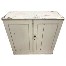 19th century painted pine cupboard, moulded rectangular top over two panelled doors, on skirted base