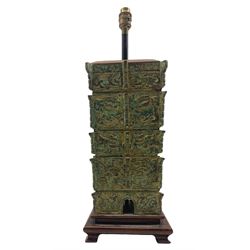 Chinese Han style archaic bronze table lamp with panels of animals, stylised flowers etc on a wooden base H39cm excluding fitting