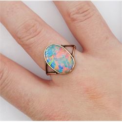 Early 20th century rose gold single stone opal ring, stamped 9ct