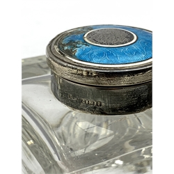 Edwardian square glass inkwell with silver and guilloche enamel lid, Birmingham, 1910 together with an early 20th century glass and silver mounted match striker, 