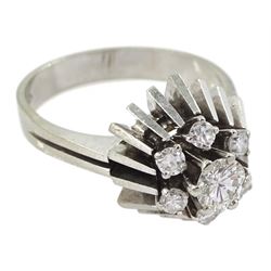 14ct white gold high stepped design diamond cluster ring, the central round brilliant cut diamond of approx 0.40 carat, with six stone diamond surround, stamped 585, total diamond weight approx 0.65 carat