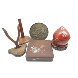 Japanese  laquer box and cover on a crimson ground, Japanese bronze mirror, vase stand etc