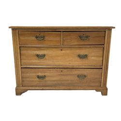 Edwardian satin walnut chest, the rectangular top over two short and two long drawers, raised on bracket supports W103cm
